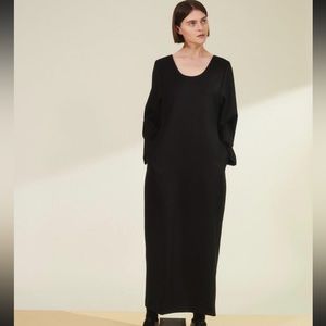 Midi black long sleeve dress. Brand “A Personal Uniform”.
